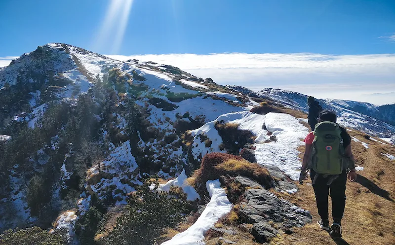 Frozen Brahmatal lake surrounded by snow in winter