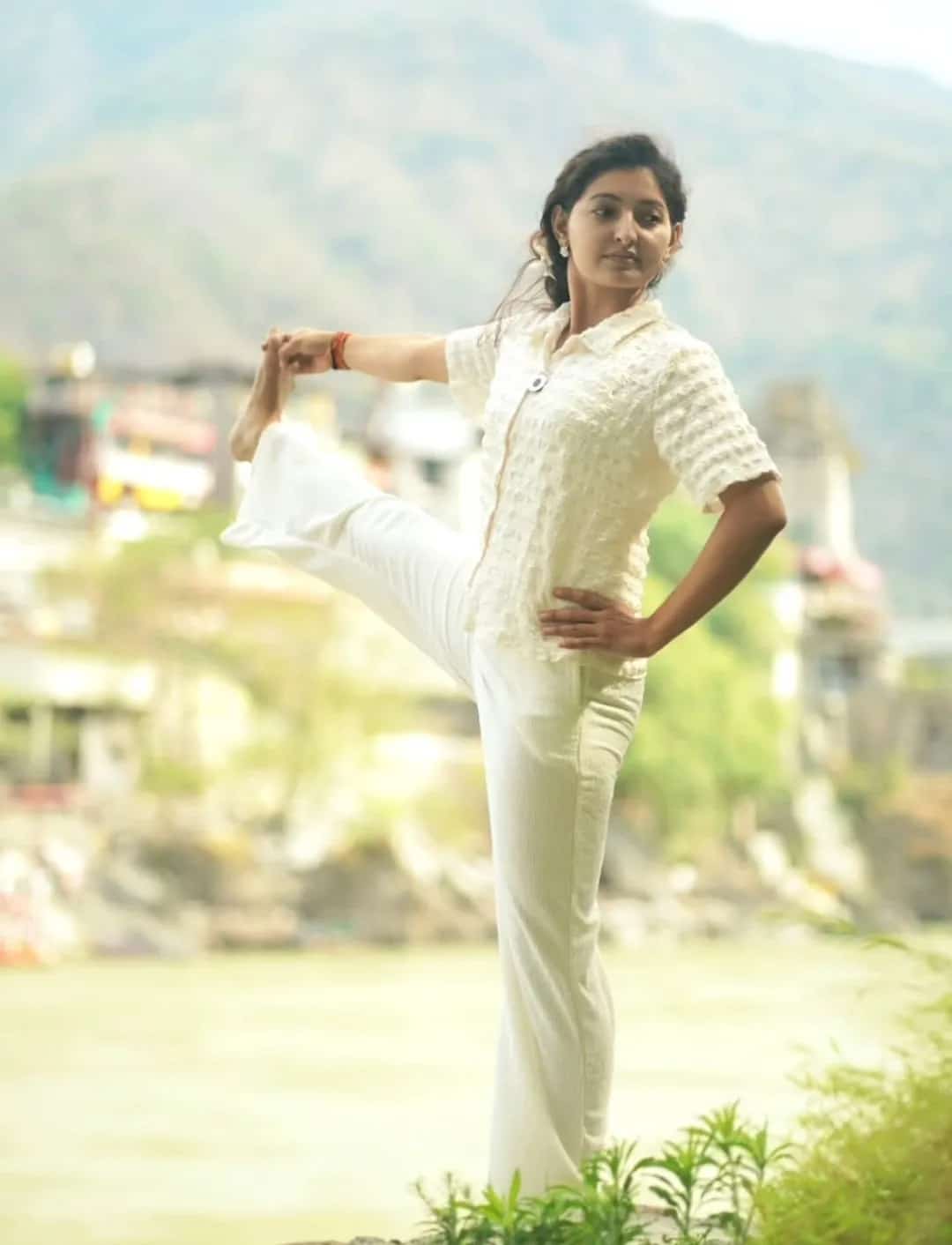 Scenic yoga pose in Rishikesh