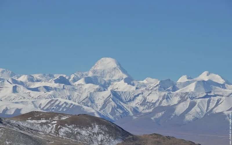 Standing triumphantly at Kuari Pass with Nanda Devi behind