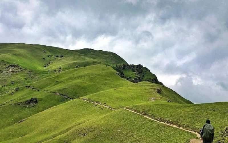 Navigating the rocky, snowy moraines on the final push to Roopkund