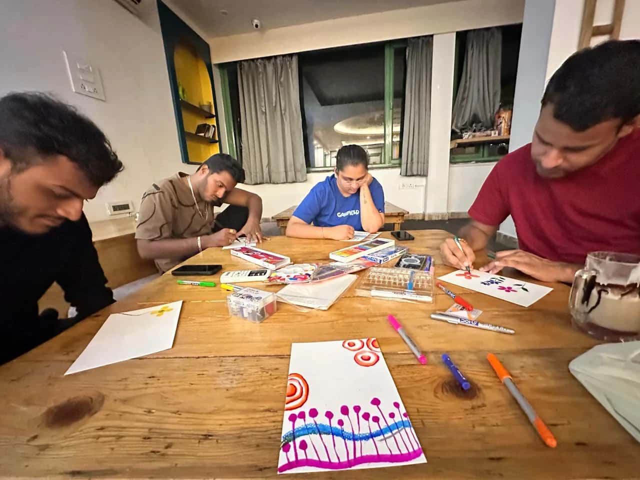 Indoor expressive art workshop during a weekend art retreat in the Himalayas