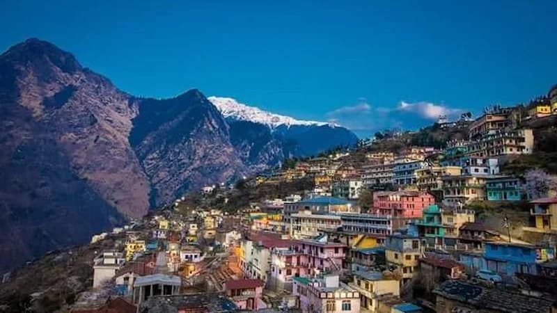 The soaring peaks of the Nanda Devi sanctuary visible from the ancient town of Joshimath