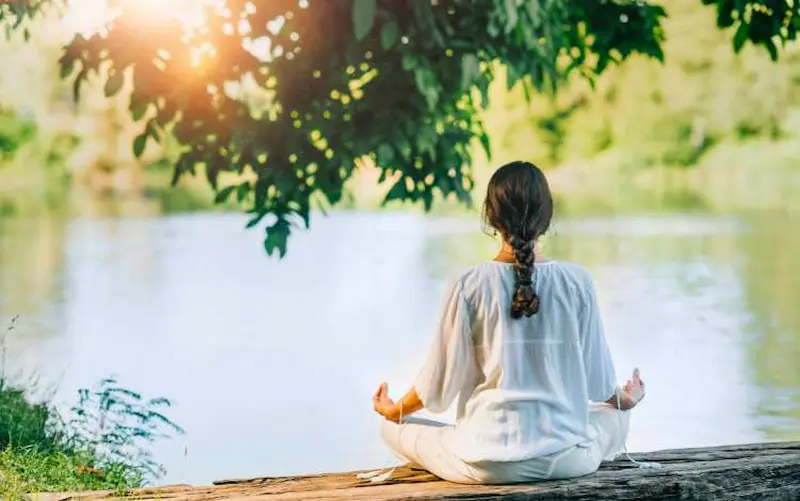 A quiet spiritual moment facing the Himalayan peaks