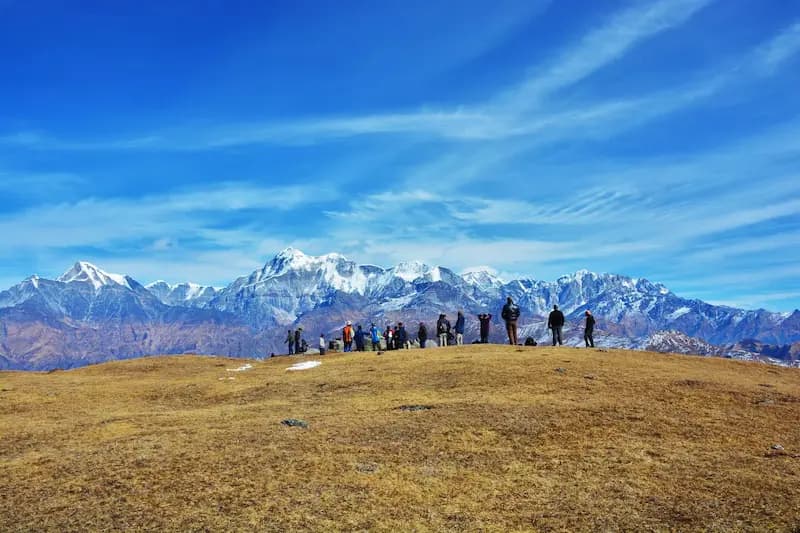 The vast rolling green and snowy meadows of Dayara Bugyal with Bandarpoonch peak
